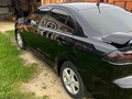 2008 Mitsubishi Lancer X, чёрный, 700000 рублей - вид 4
