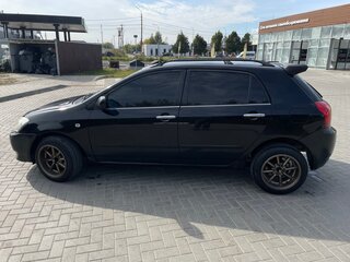 2002 Toyota Corolla Runx IX (E120, E130), чёрный, 350000 рублей, вид 3