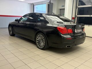 2009 BMW 7 серии 740i V (F01/F02/F04), чёрный, 680000 рублей, вид 2