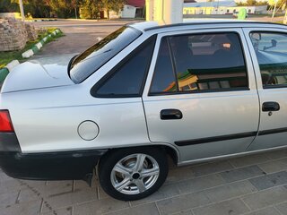 2015 Daewoo Nexia I Рестайлинг, серебристый, 315000 рублей, вид 3