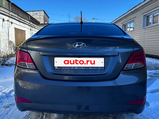2016 Hyundai Solaris I Рестайлинг, жёлтый, 700000 рублей, вид 5