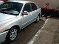 2006 Kia Spectra I Рестайлинг 2, серебристый, 130000 рублей - вид 1