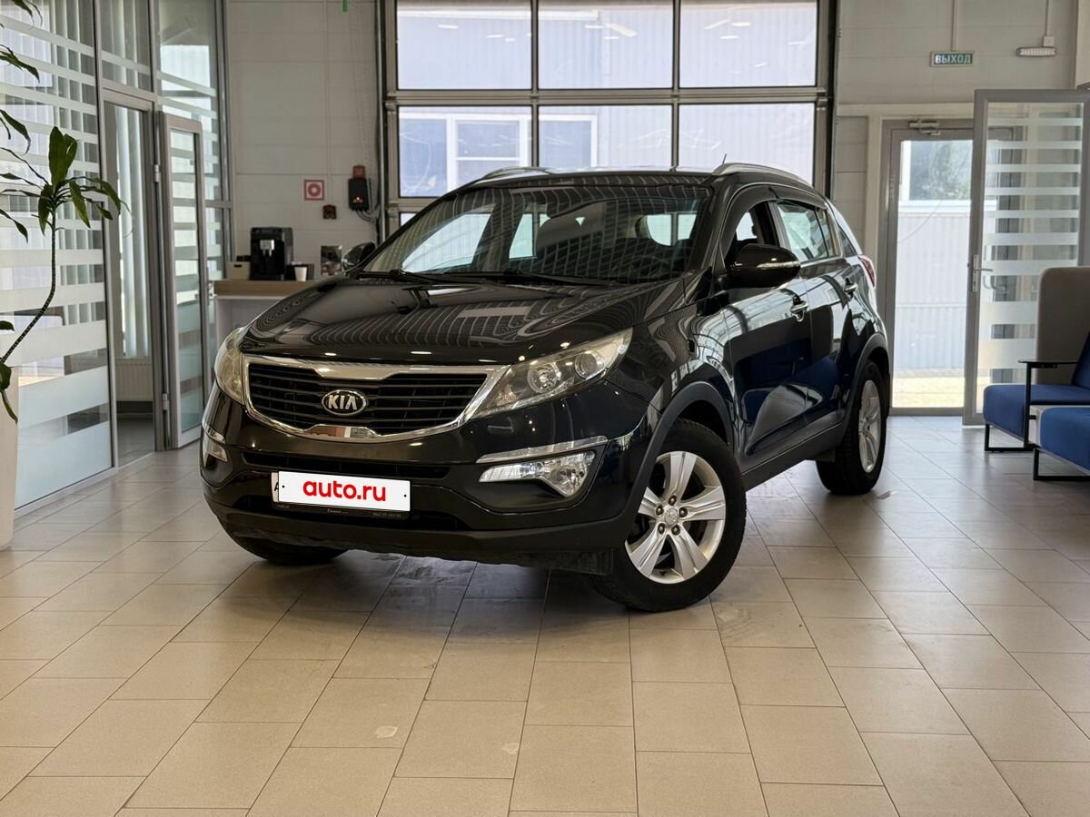 Открыть фотографии: Kia Sportage III