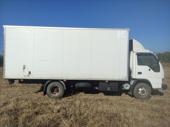 2001 Isuzu Elf (N-series), белый, 1350000 рублей - вид 6