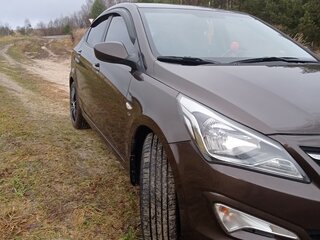 2014 Hyundai Solaris I Рестайлинг, коричневый, 950000 рублей, вид 4