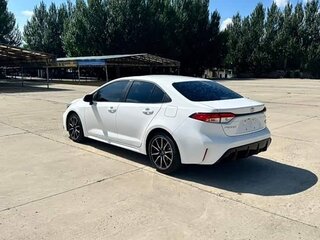 2023 Toyota Corolla Sporty XII (E210) Рестайлинг, белый, 1199999 рублей, вид 4