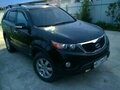 2009 Kia Sorento II, чёрный - вид 1