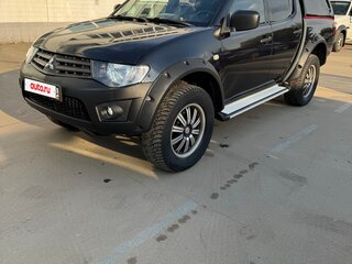 2010 Mitsubishi L200 IV, синий, 1450000 рублей, вид 1
