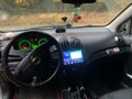 2010 Chevrolet Aveo I Рестайлинг, серебристый, 120000 рублей - вид 6