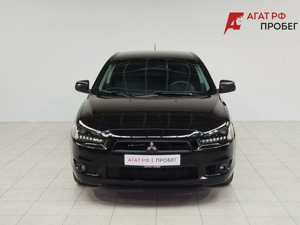 2010 Mitsubishi Lancer X, чёрный, 750000 рублей - вид 1