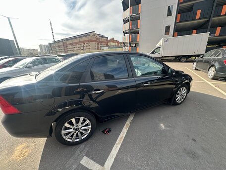 2011 Ford Focus II Рестайлинг, чёрный, 520000 рублей, вид 4