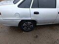 2011 Daewoo Nexia I Рестайлинг, серебристый, 140000 рублей - вид 3