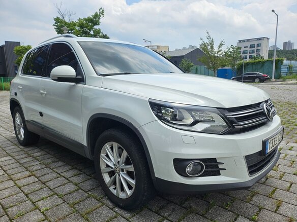 2014 Volkswagen Tiguan I Рестайлинг, белый, 1550000 рублей - вид 2
