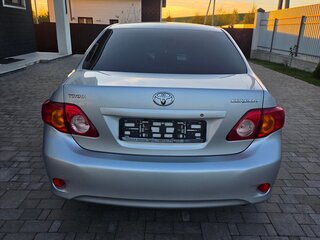 2010 Toyota Corolla X (E140, E150), серебристый, 1150000 рублей, вид 3