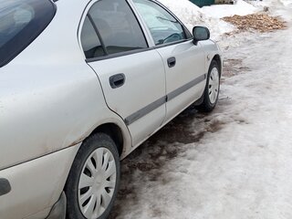 2001 Mitsubishi Carisma I Рестайлинг, серебристый, 350000 рублей, вид 1