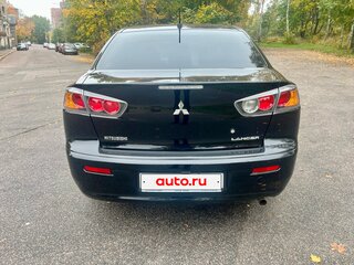 2010 Mitsubishi Lancer X, чёрный, 589500 рублей, вид 4