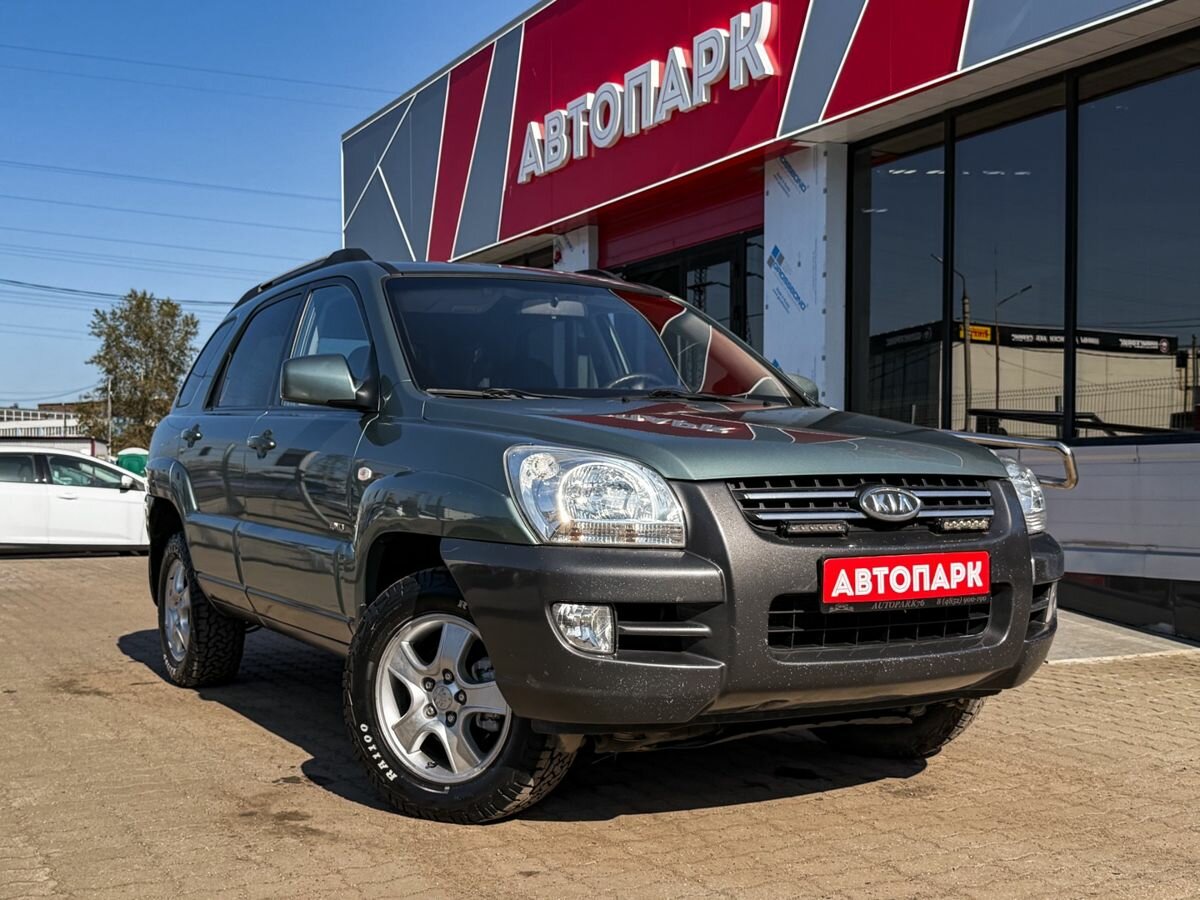 Открыть фотографии: Kia Sportage II