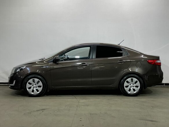 2014 Kia Rio III, коричневый - вид 7