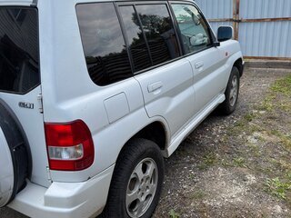1999 Mitsubishi Pajero iO, белый, 520000 рублей, вид 4