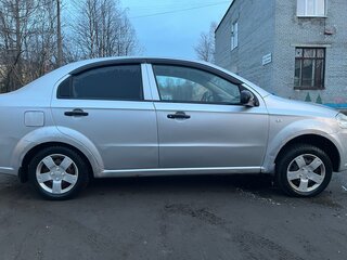 2011 Chevrolet Aveo I Рестайлинг, серебристый, 320000 рублей, вид 3
