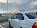2004 Suzuki Aerio, белый, 450000 рублей - вид 2