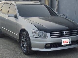 2002 Nissan Stagea II, серый, 1350000 рублей, вид 1