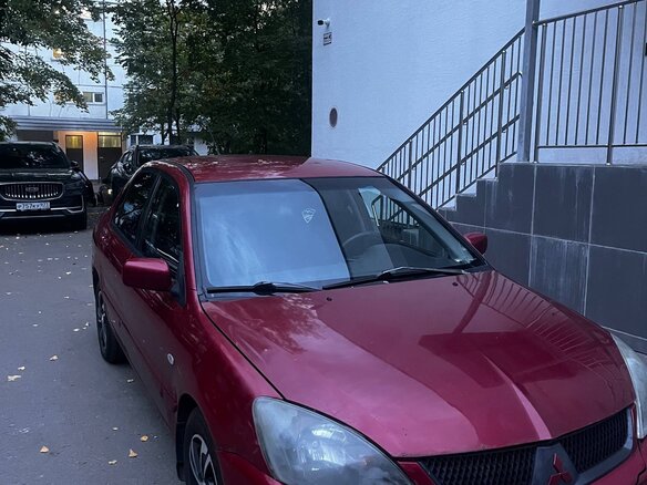 2004 Mitsubishi Lancer IX, красный, 309000 рублей - вид 1
