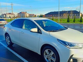 2016 Toyota Corolla XI (E160, E170, E180) Рестайлинг 1, белый, 1300000 рублей, вид 3