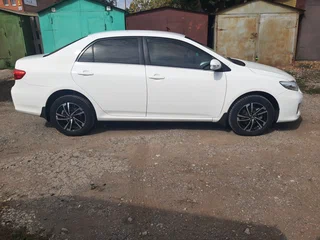2010 Toyota Corolla X (E140, E150) Рестайлинг, белый, 1040000 рублей, вид 3