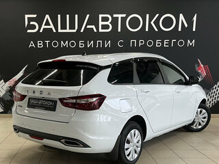 2023 Lada (ВАЗ) Vesta SW I Рестайлинг (NG), белый, 1325000 рублей, вид 4