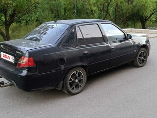 2009 Daewoo Nexia I Рестайлинг, чёрный, 150000 рублей, вид 3