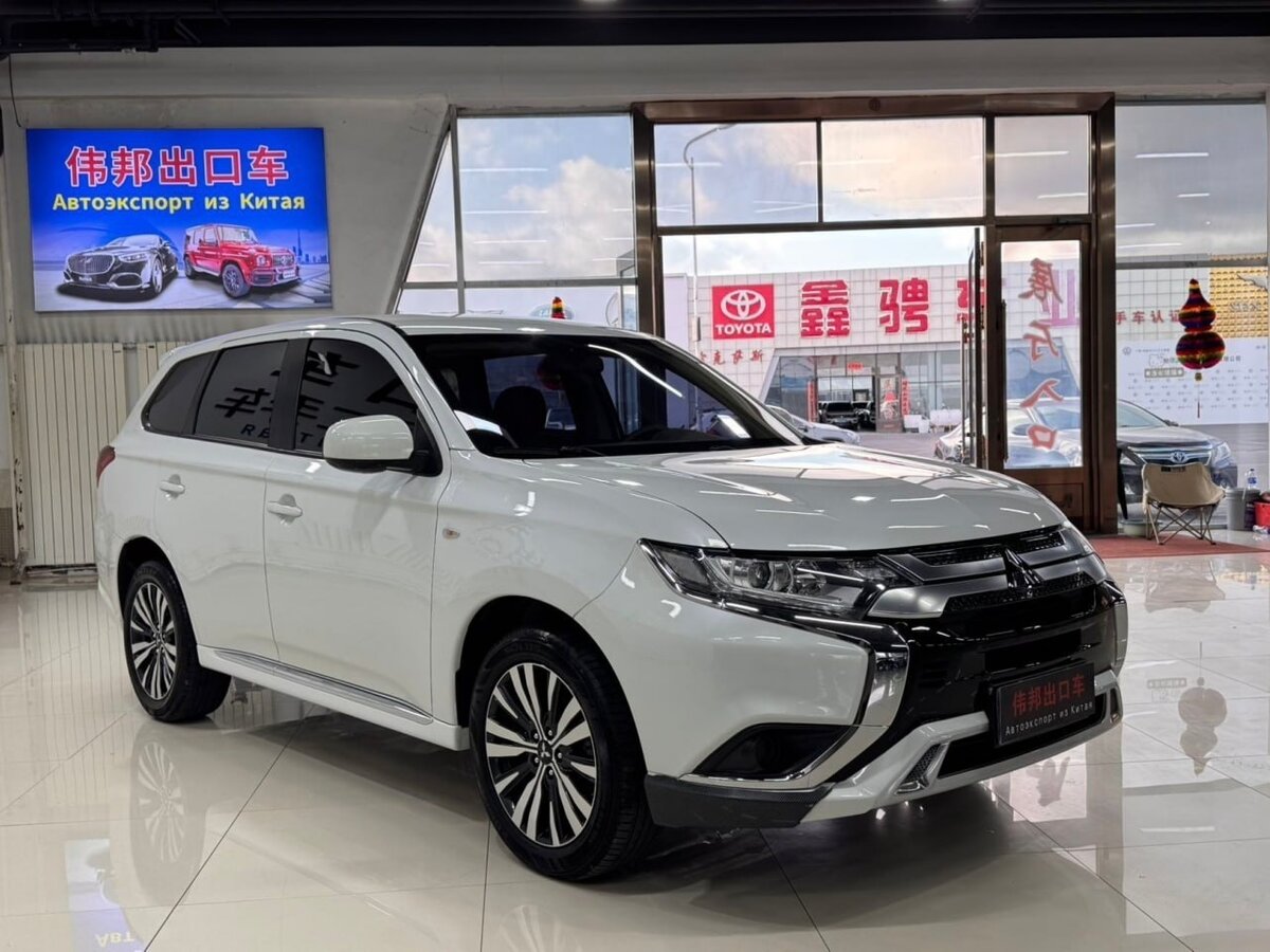 Открыть фотографии: Mitsubishi Outlander III Рестайлинг 3
