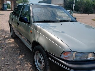 2007 Daewoo Nexia I, серебристый, 230000 рублей, вид 1