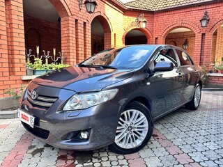 2010 Toyota Corolla X (E140, E150), серый, 990000 рублей, вид 1