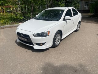 2011 Mitsubishi Lancer X Рестайлинг, белый, 700000 рублей, вид 1