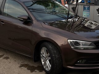2016 Volkswagen Jetta VI Рестайлинг, коричневый, 1390000 рублей, вид 4