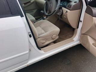 2001 Toyota Corolla Fielder IX (E120, E130), белый, 400000 рублей, вид 3
