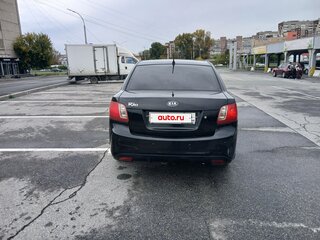 2010 Kia Rio II Рестайлинг, чёрный, 360000 рублей, вид 4