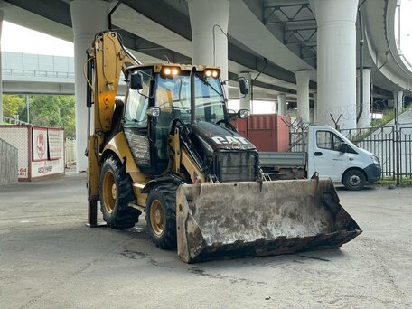 2011 Caterpillar 428, жёлтый, 3675000 рублей, вид 1