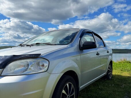 2011 Chevrolet Aveo I Рестайлинг, серебристый, 400000 рублей, вид 4