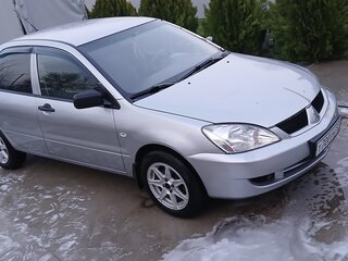 2008 Mitsubishi Lancer IX Рестайлинг, серебристый, 450000 рублей, вид 4