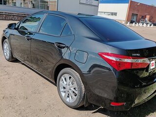 2014 Toyota Corolla XI (E160, E170, E180), чёрный, 1950000 рублей, вид 3