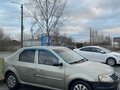 2013 Renault Logan I Рестайлинг, бежевый, 250000 рублей - вид 1