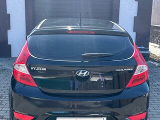 2013 Hyundai Solaris I, чёрный, 700000 рублей, вид 4