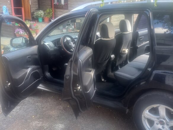2010 Mitsubishi Outlander II Рестайлинг, чёрный, 1050000 рублей - вид 9