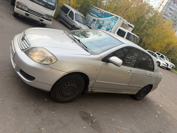 2005 Toyota Corolla IX (E120, E130) Рестайлинг, серебристый, 430000 рублей - вид 1