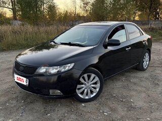 2011 Kia Cerato 6-speed II, чёрный, 670000 рублей, вид 1