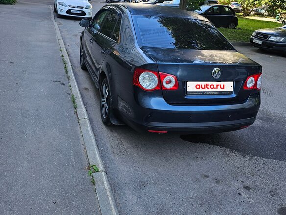 2010 Volkswagen Jetta V, серый - вид 4