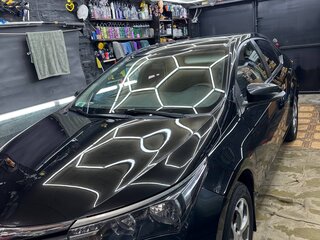 2013 Toyota Corolla XI (E160, E170, E180), чёрный, 1050000 рублей, вид 2