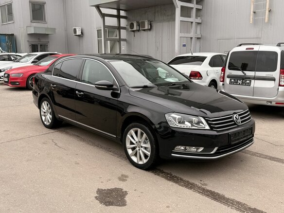 2012 Volkswagen Passat B7, чёрный - вид 2